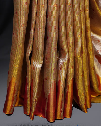 Elegant Gold Tissue Kanjivaram Saree with Red Butta Weaving Elegant Gold Tissue Kanjivaram Saree with Red Butta Weaving