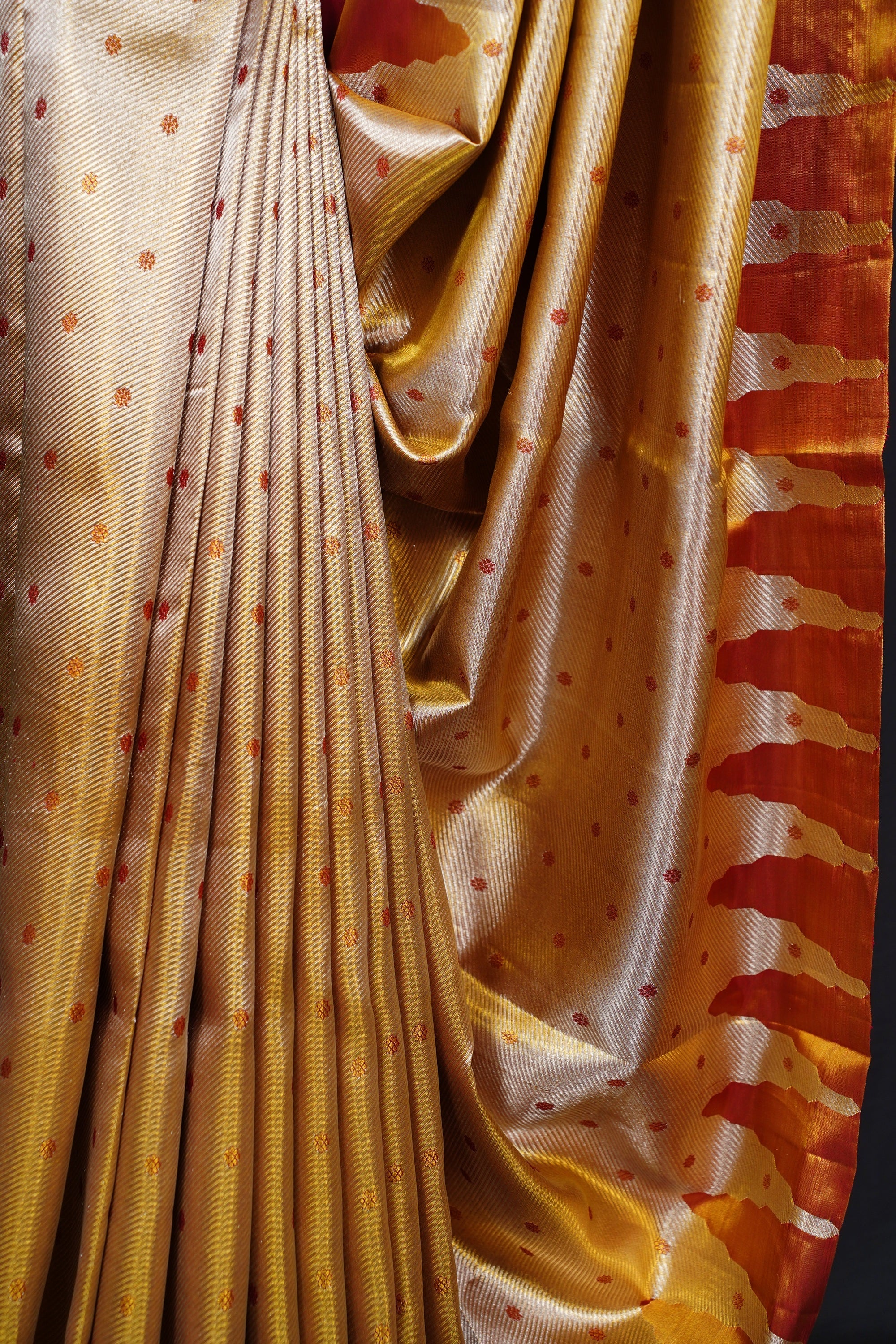 Elegant Gold Tissue Kanjivaram Saree with Red Butta Weaving Elegant Gold Tissue Kanjivaram Saree with Red Butta Weaving