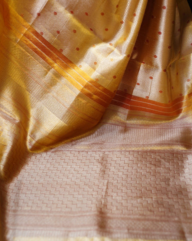 Elegant Gold Tissue Kanjivaram Saree with Red Butta Weaving Elegant Gold Tissue Kanjivaram Saree with Red Butta Weaving