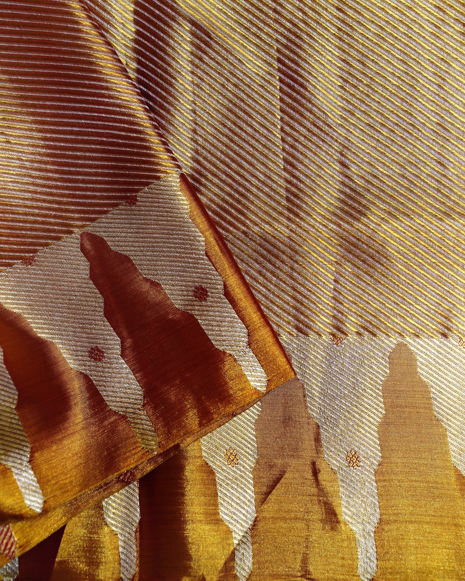 Elegant Gold Tissue Kanjivaram Saree with Red Butta Weaving Elegant Gold Tissue Kanjivaram Saree with Red Butta Weaving