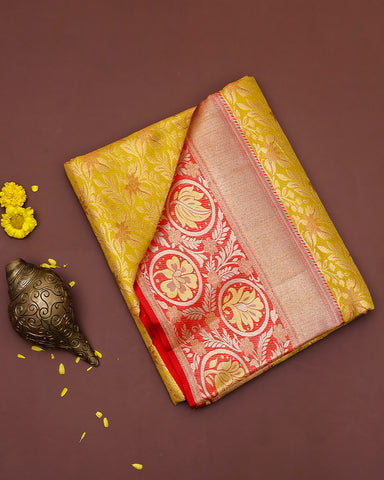 The yellow tissue Kanjivaram silk saree