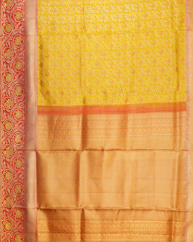 The yellow tissue Kanjivaram silk saree