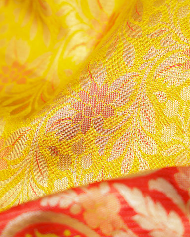 The yellow tissue Kanjivaram silk saree