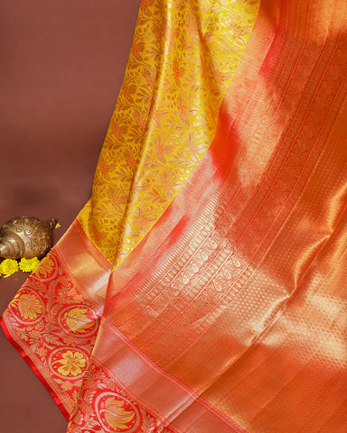 The yellow tissue Kanjivaram silk saree