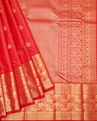 The red Kanjivaram silk saree