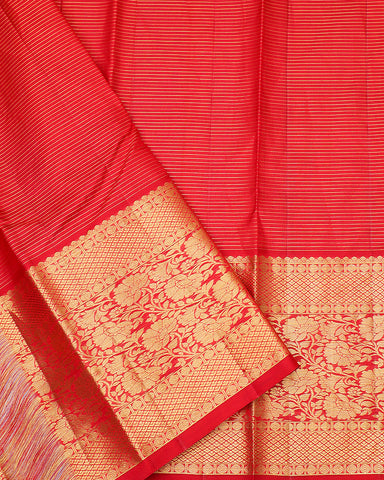 The red Kanjivaram silk saree