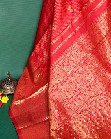 The red Kanjivaram silk saree