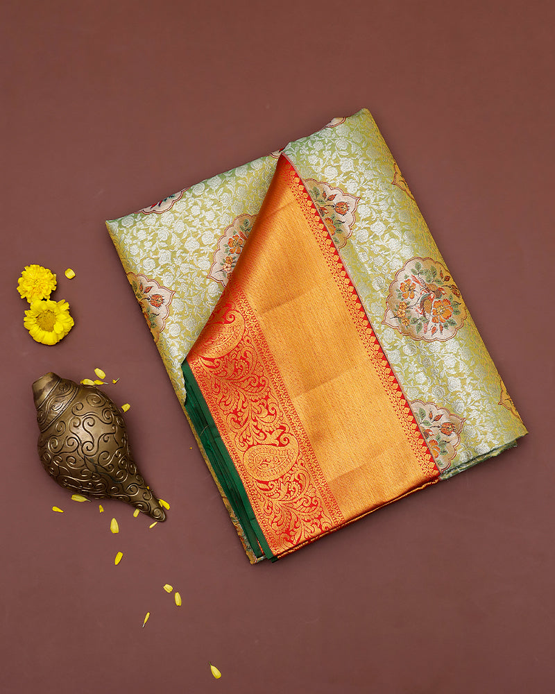 The light green tissue Kanjivaram saree