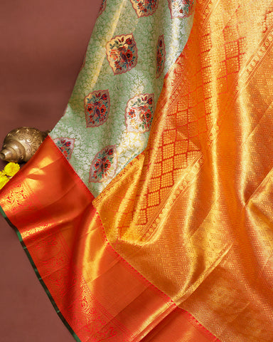 The light green tissue Kanjivaram saree