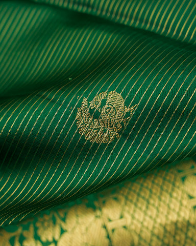 The green Kanjivaram silk saree