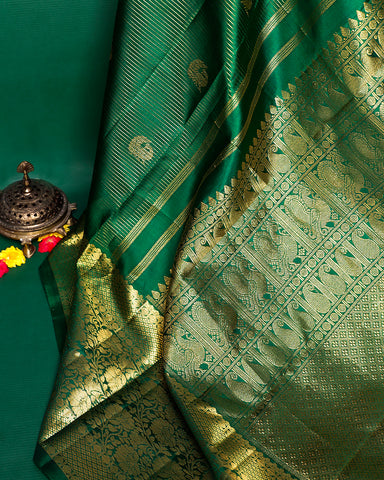 The green Kanjivaram silk saree