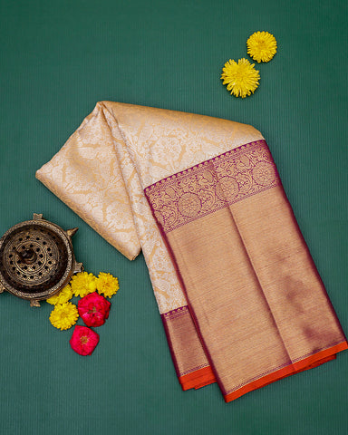 The peach Kanjivaram silk saree