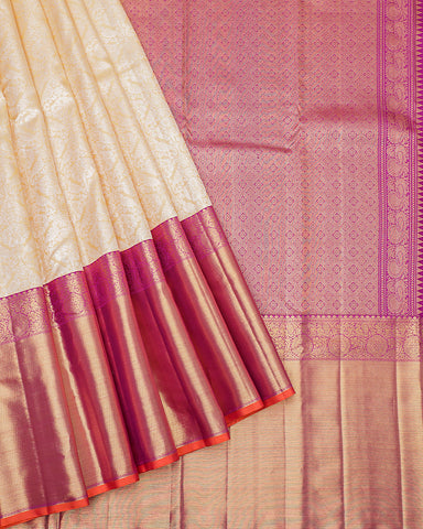 The peach Kanjivaram silk saree