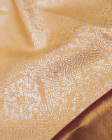 The peach Kanjivaram silk saree