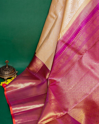 The peach Kanjivaram silk saree