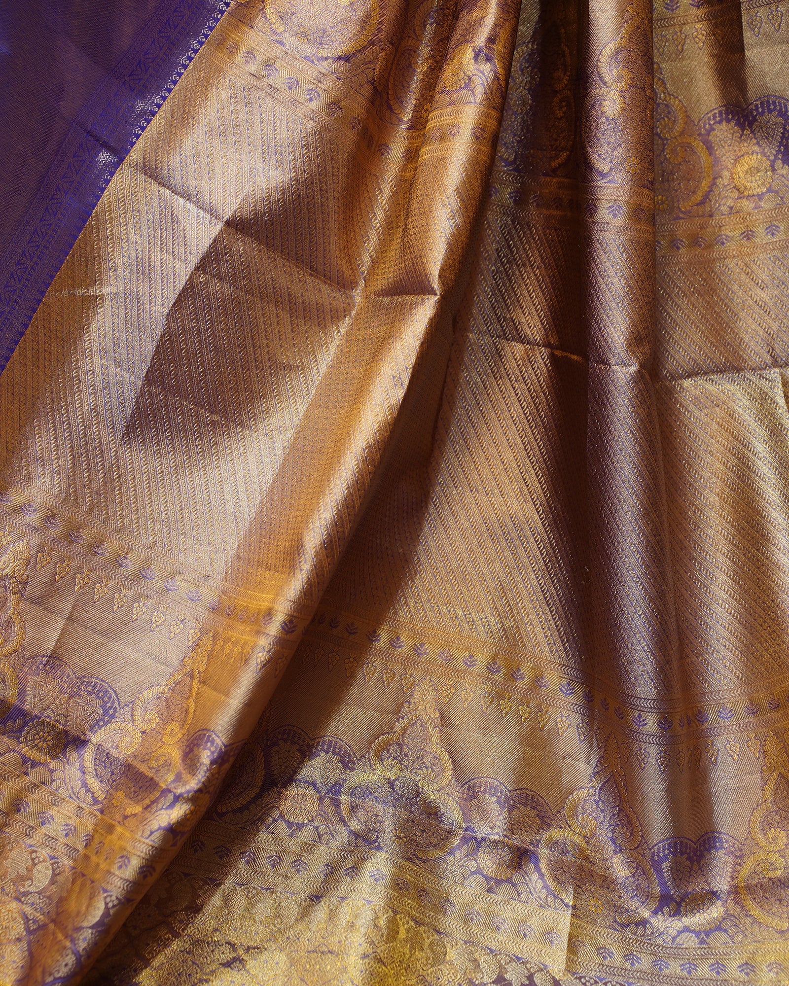 Regal Gold Tissue Kanjivaram Silk Saree with Contrast Blue Elegance