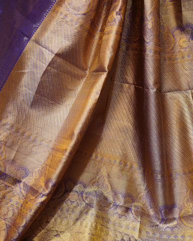 Regal Gold Tissue Kanjivaram Silk Saree with Contrast Blue Elegance