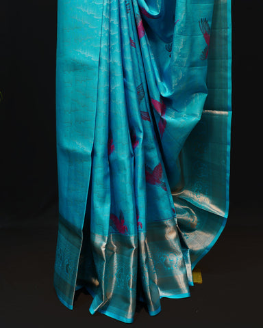 Enchanting Aqua Elegance – Meenakari Bird Weaves in Kanjivaram Silk