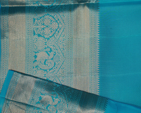 Enchanting Aqua Elegance – Meenakari Bird Weaves in Kanjivaram Silk