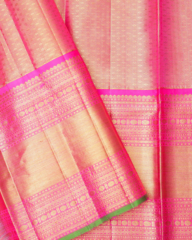 The gold tissue Kanjivaram saree